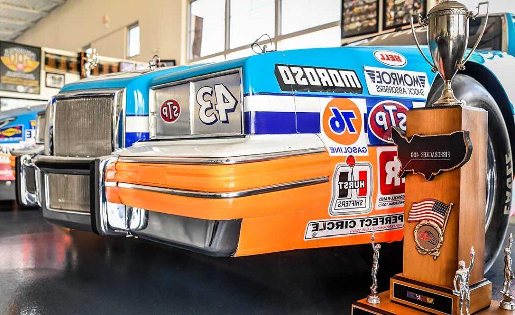 race car and trophy in museum